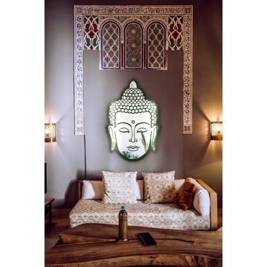 carved wall mirror depicting Buddha