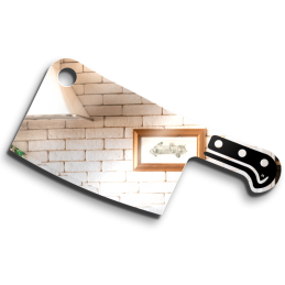 cleaver-shaped mirror - carved glass